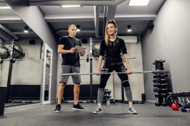 Image of a person working with a personal trainer on NPTIFL's website