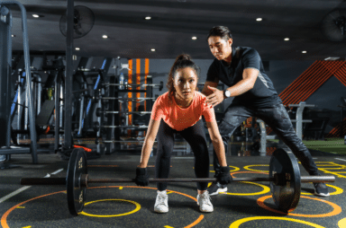 Image of a personal trainer working with a client
