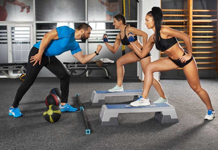 Fitness trainer and girls