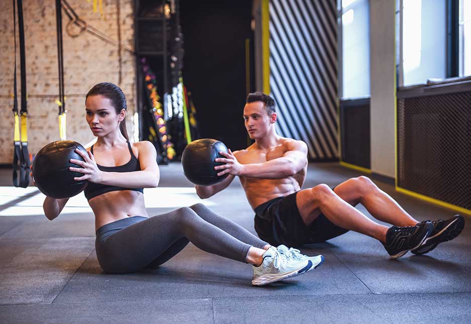 Beautiful young sports couple is working out