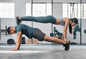Strength, active and fit couple exercising